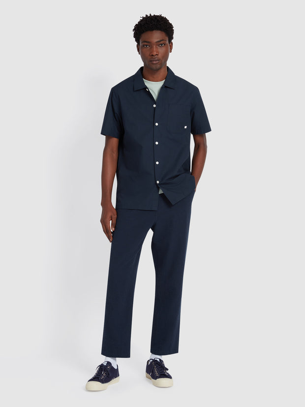 Hawtin Relaxed Tapered Fit Seersucker Trousers In True Navy